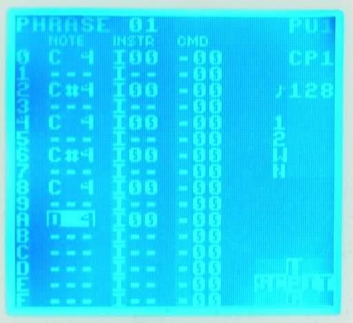 Blue backlit DMG screen running inverted palette LSDj